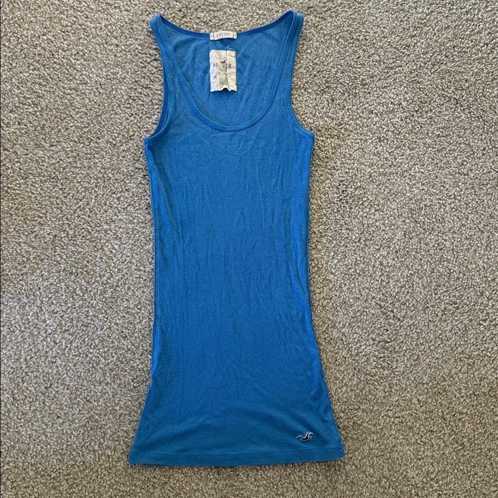 Hollister brand woman’s stretch tank top; long length in blue color size medium
